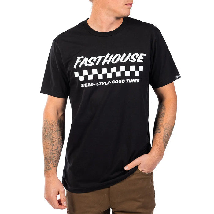 Person wearing a black t-shirt with 'Fasthouse' logo and text on a white background