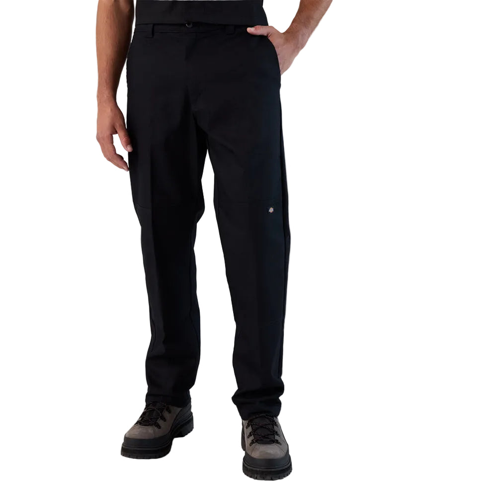 Person wearing black pants on a white background